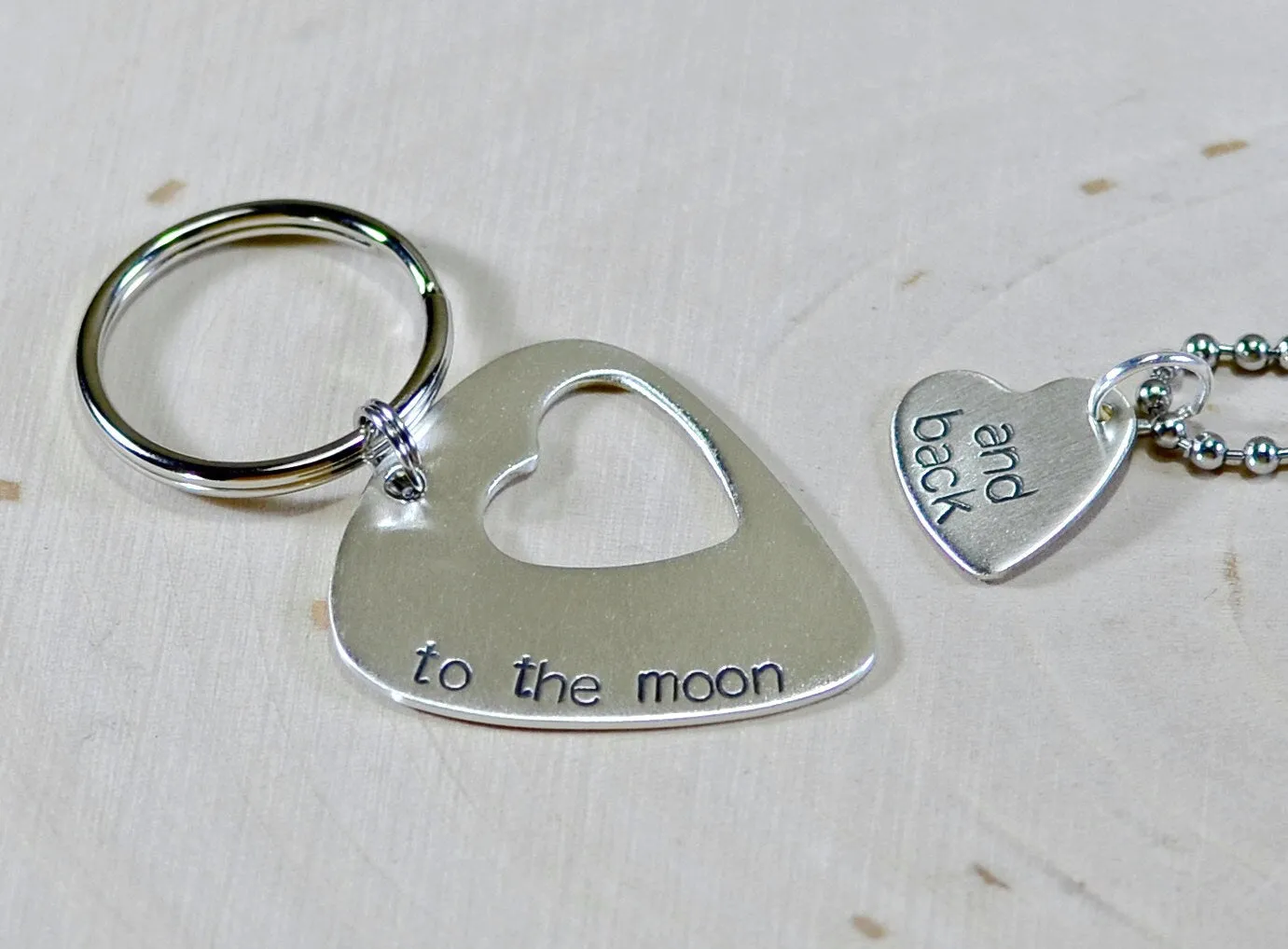 Couples sterling silver guitar pick keychain and necklace with love to the moon and back