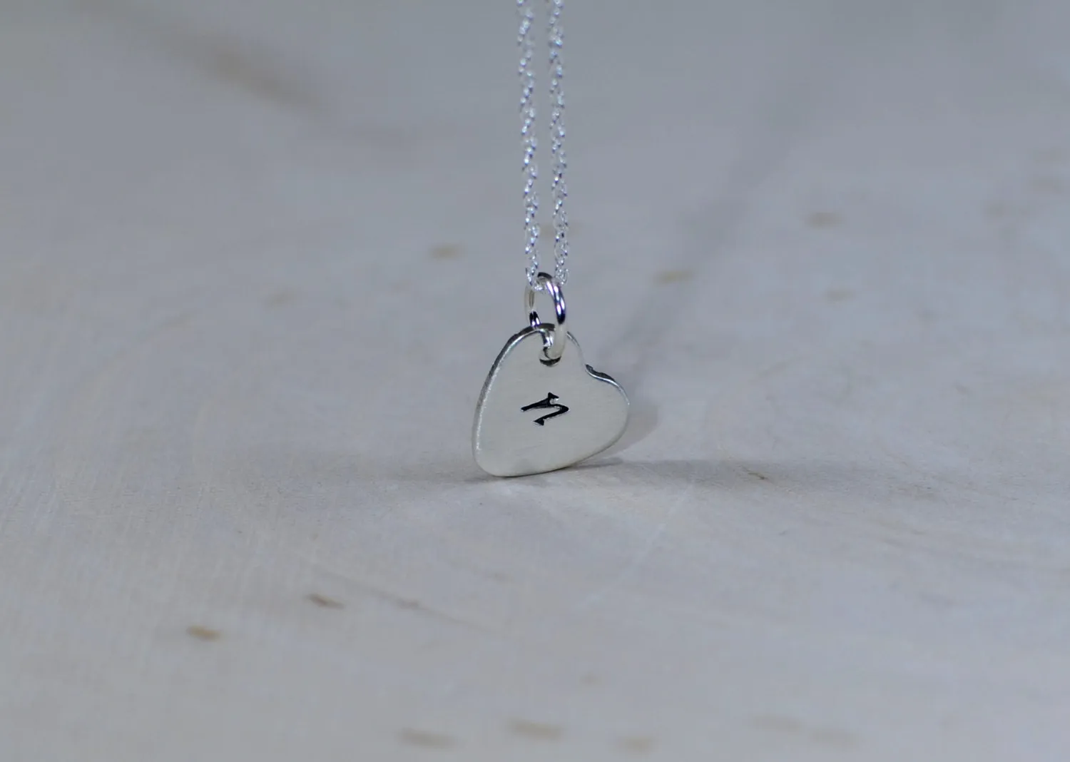 Engraved initial in sterling silver heart charm
