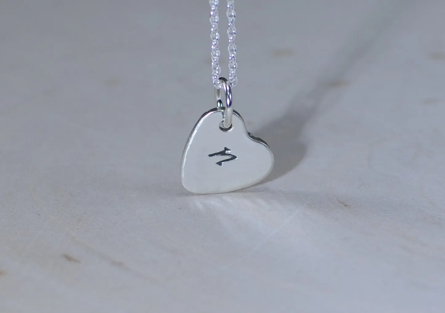 Engraved initial in sterling silver heart charm