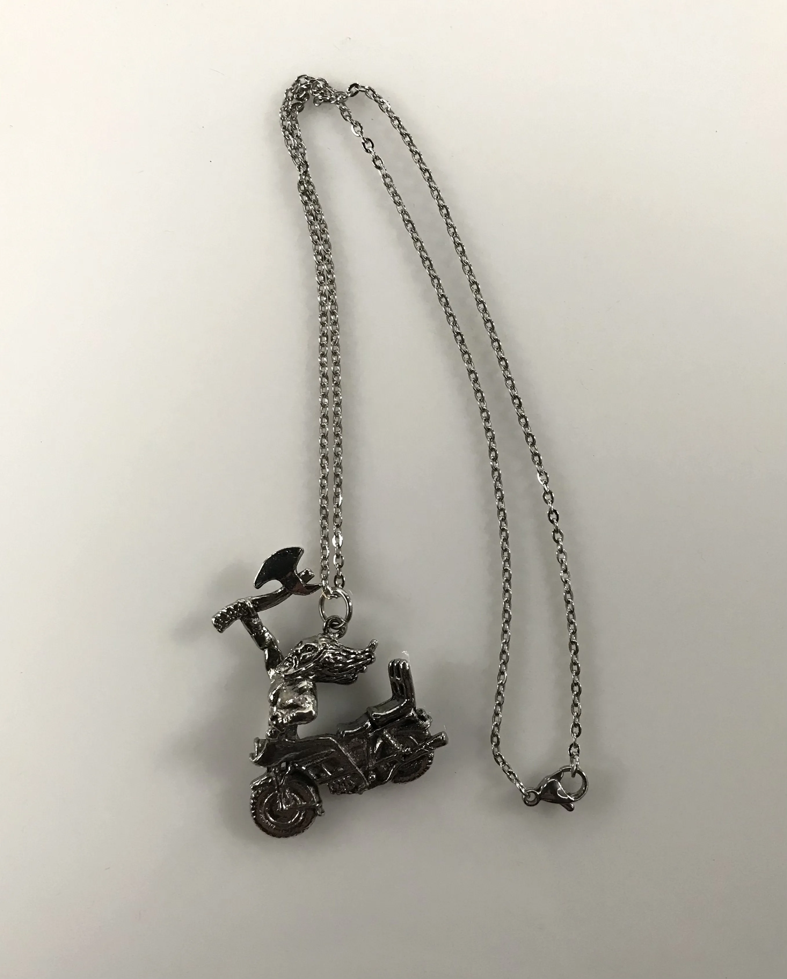 NOS G&S 1980s motorcycle axe man novelty pendant necklace