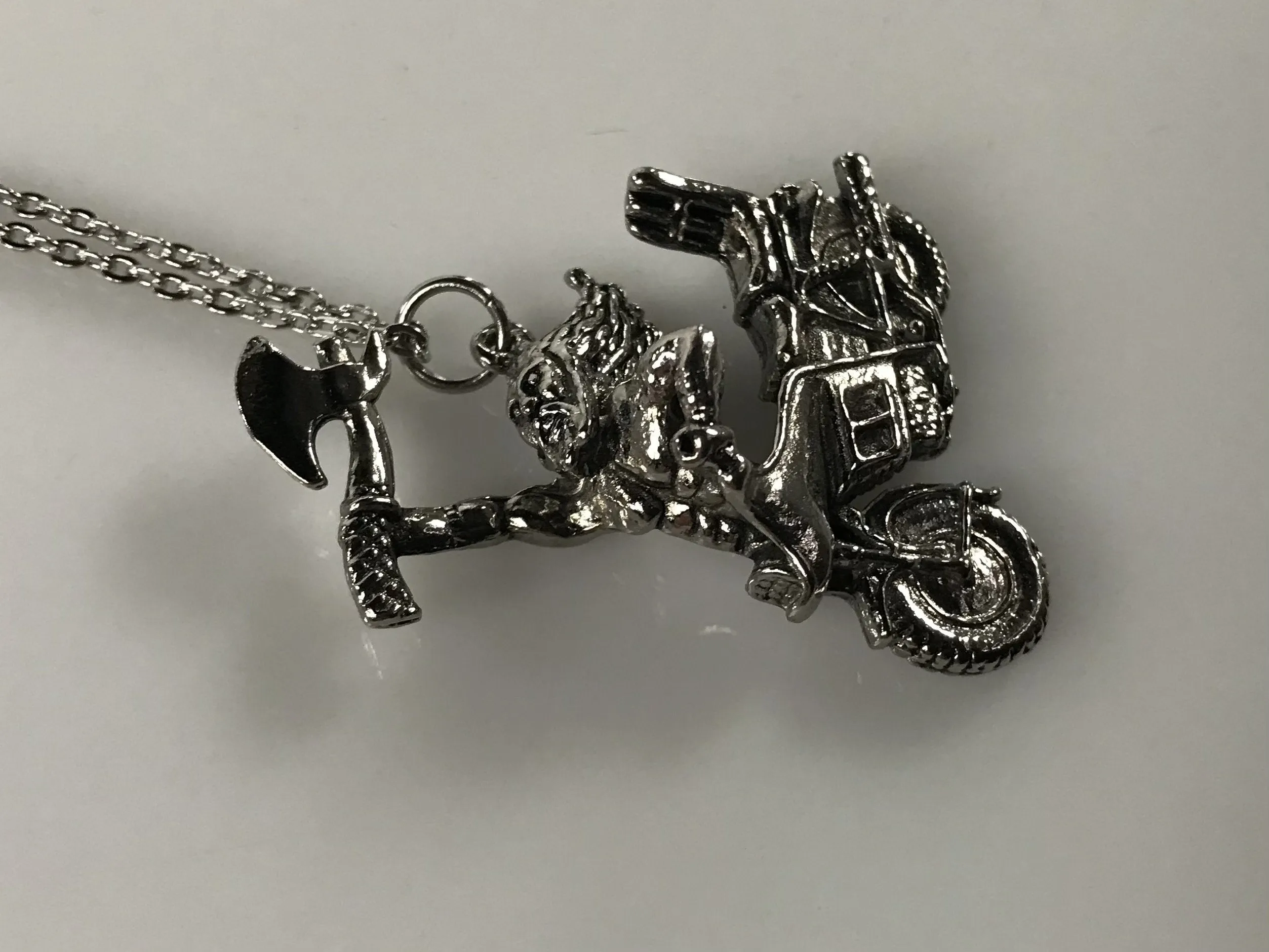 NOS G&S 1980s motorcycle axe man novelty pendant necklace