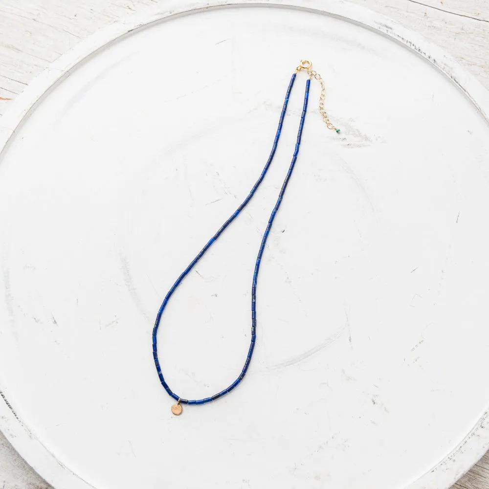 Petite Yellow Bronze Disc Necklace on Lapis Tube Strand