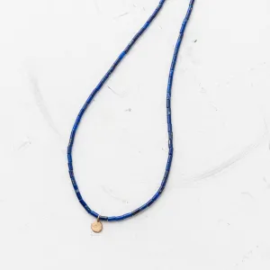 Petite Yellow Bronze Disc Necklace on Lapis Tube Strand