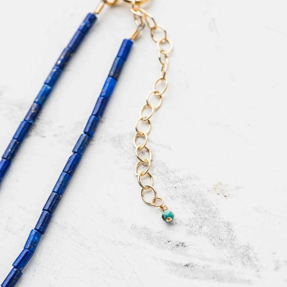 Petite Yellow Bronze Disc Necklace on Lapis Tube Strand