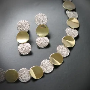 Rough and smooth texture link chain in silver & gold