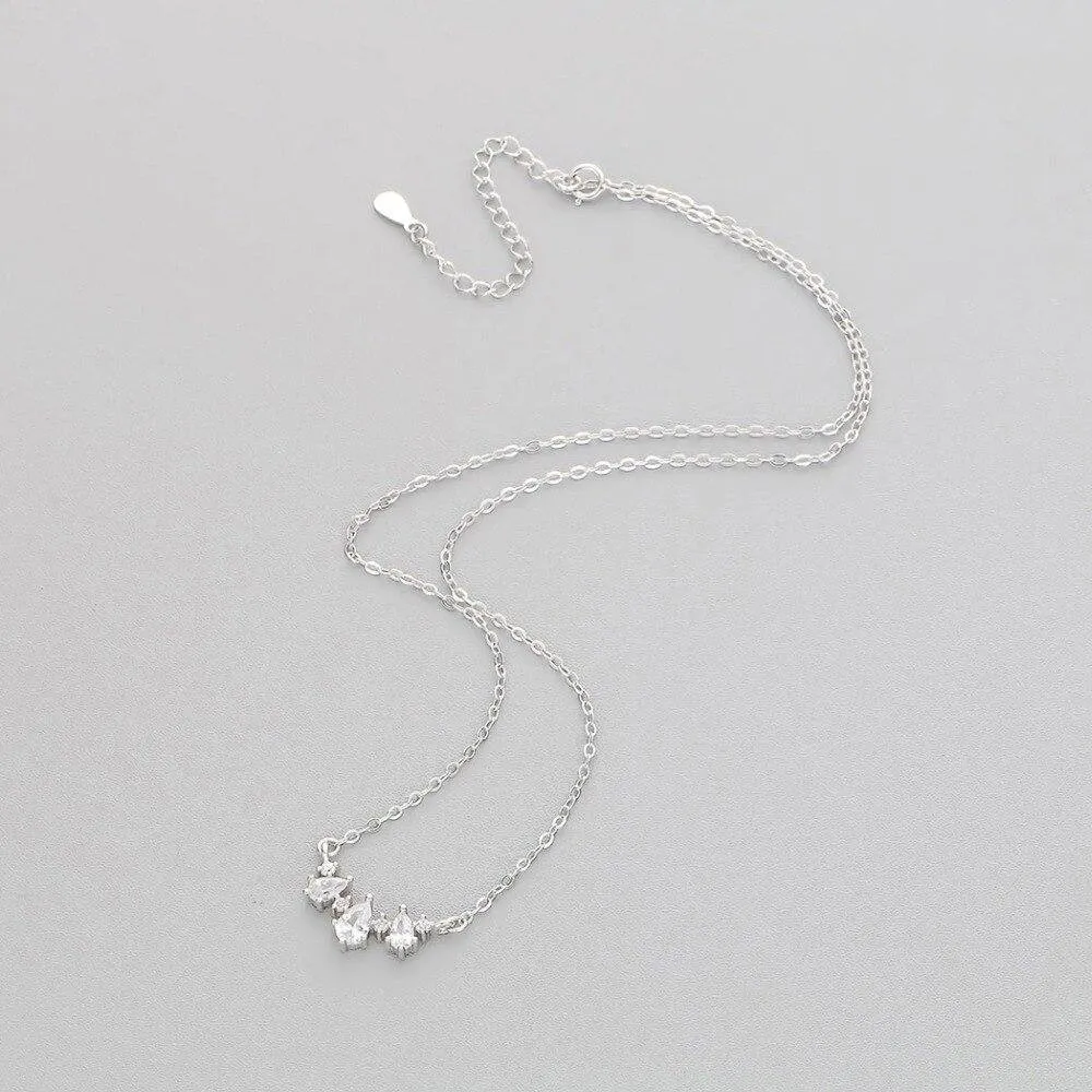 Silver Plated Crystal Pear Shaped Curved Bar Necklace