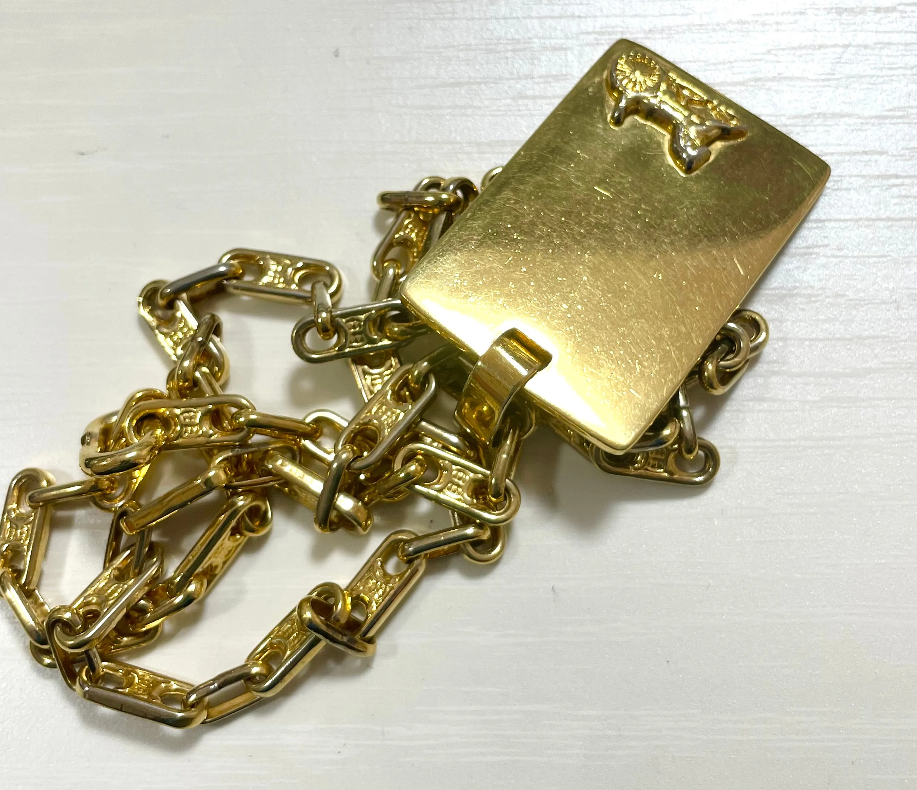 Vintage Celine golden necklace with triomphe chains and a carriage and logo featured rectangular plate top. 070218ys2