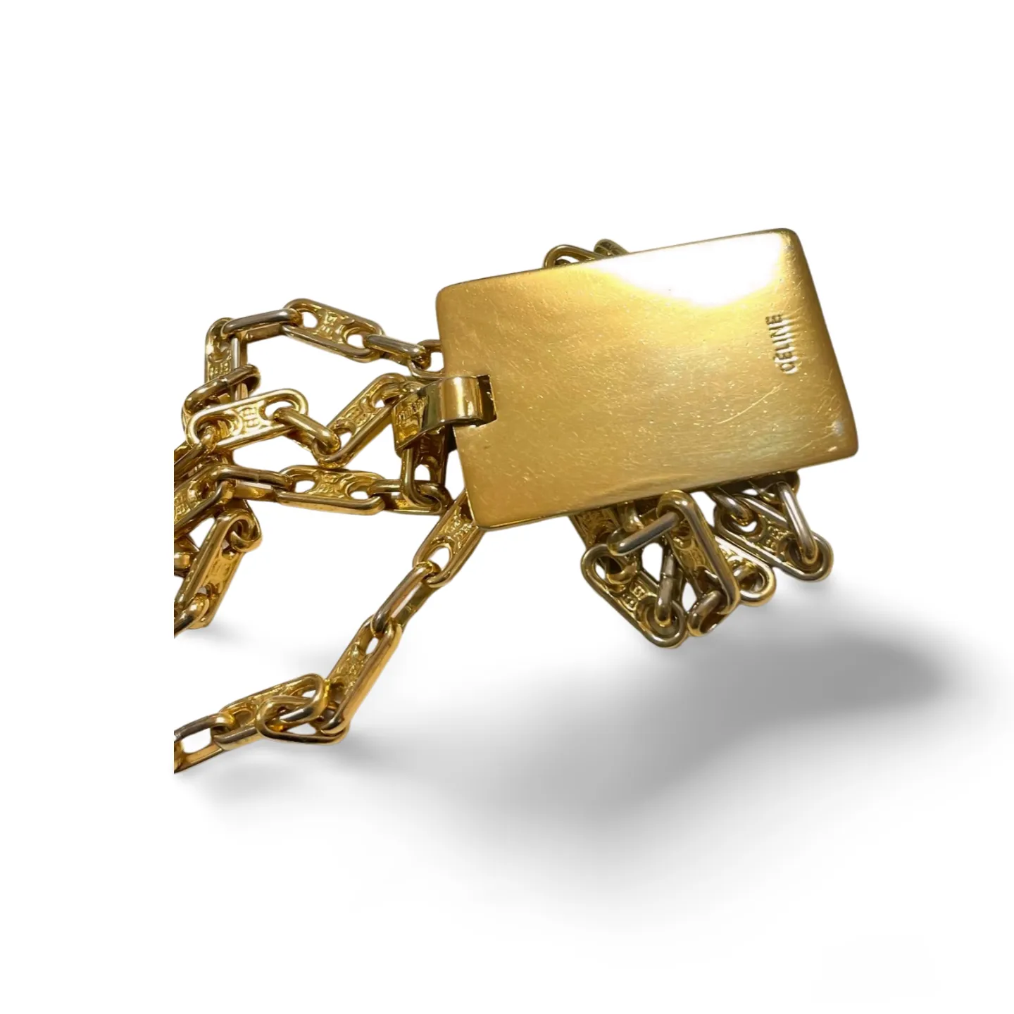 Vintage Celine golden necklace with triomphe chains and a carriage and logo featured rectangular plate top. 070218ys2
