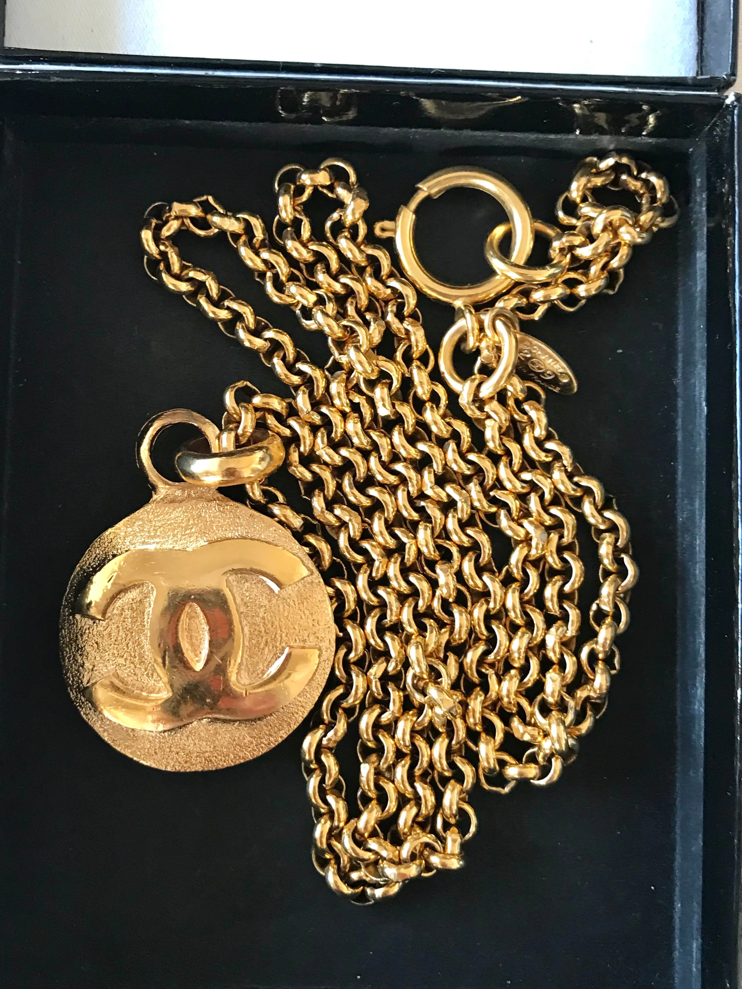 Vintage CHANEL golden chain necklace with round CC mark charm pendant top. Gorgeous jewelry. Best gift idea.