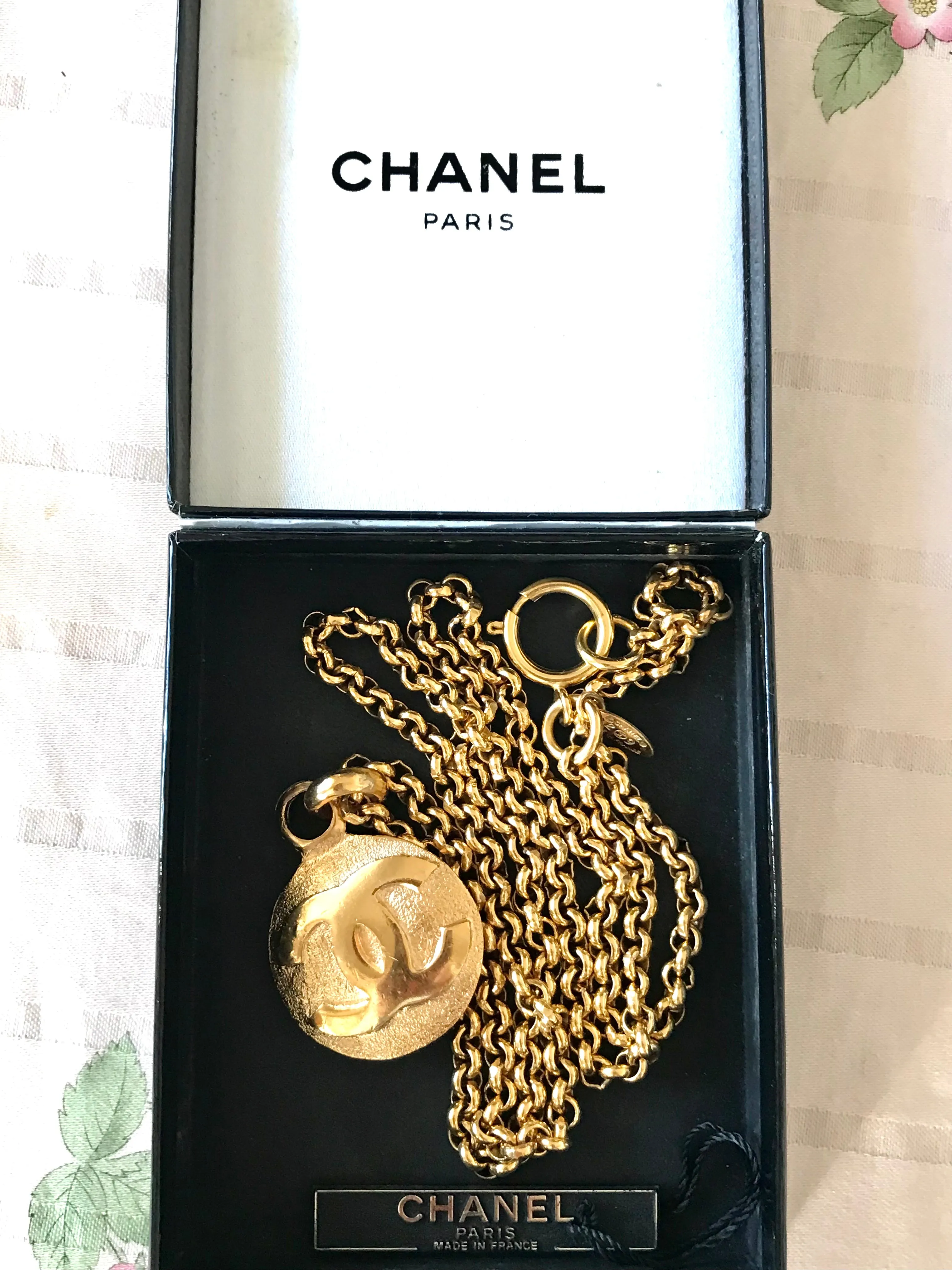 Vintage CHANEL golden chain necklace with round CC mark charm pendant top. Gorgeous jewelry. Best gift idea.
