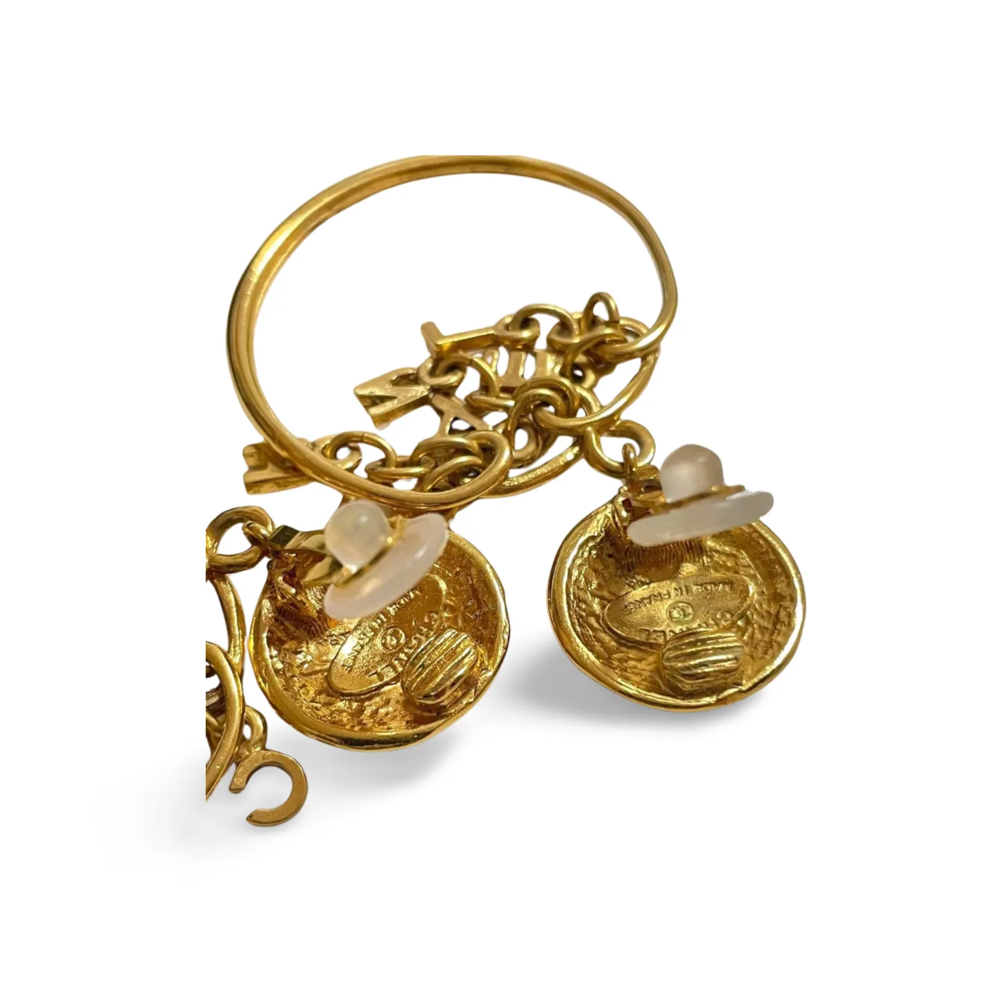 Vintage CHANEL golden round motif and logo letter dangling earrings. Rare and adorable jewelry for your collection. 060820ac3