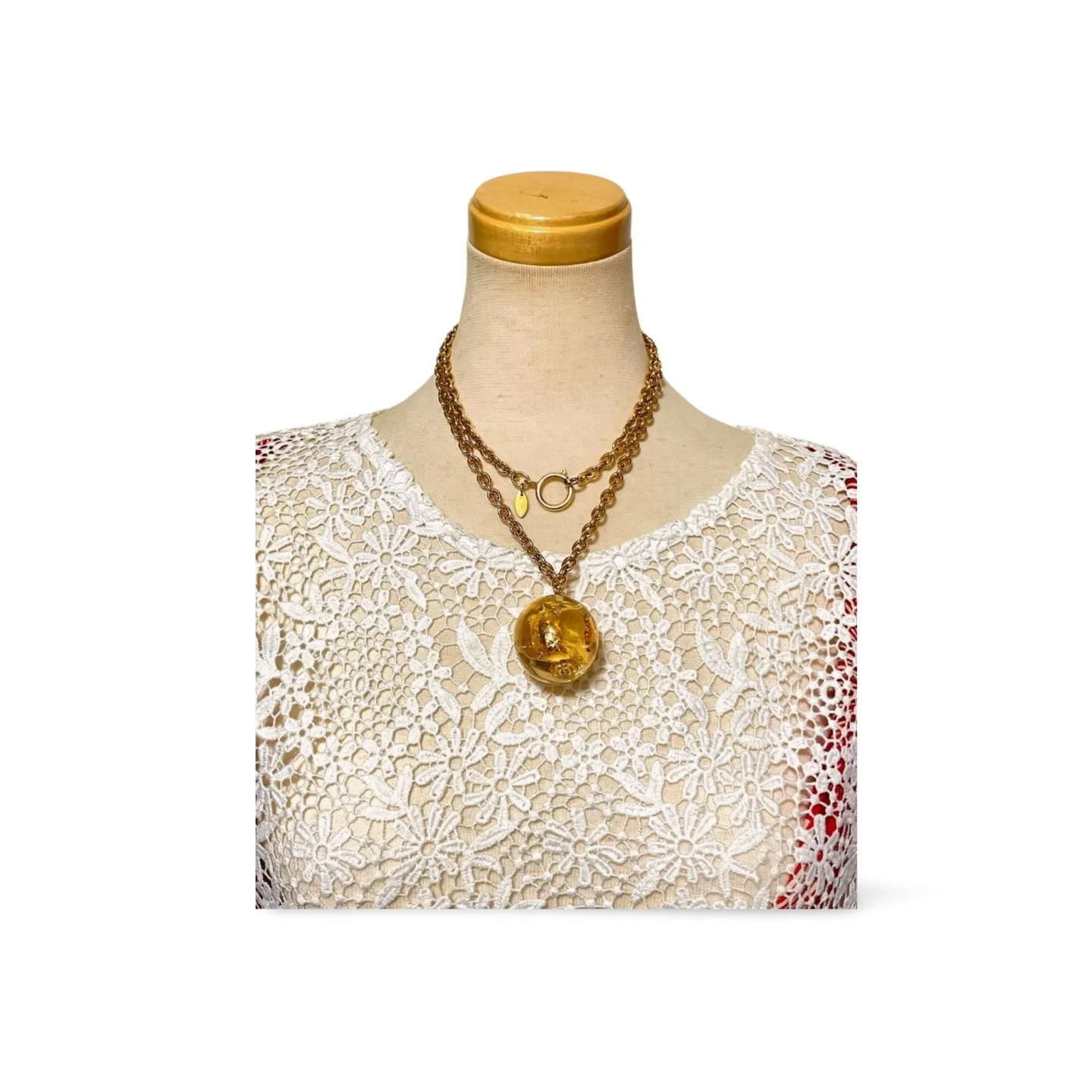 Vintage CHANEL long chain necklace with resin ball top, CC mark, turtle, camellia, clover, and 2.55 bag motifs in it. 060312ac4