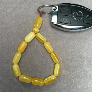 YELLOW/WHITE AMBER KEYCHAIN 8,2x16,3mm 11,8g